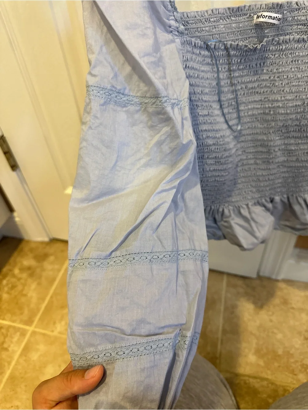 Reformation Roland Smocked Top in Mineral Blue